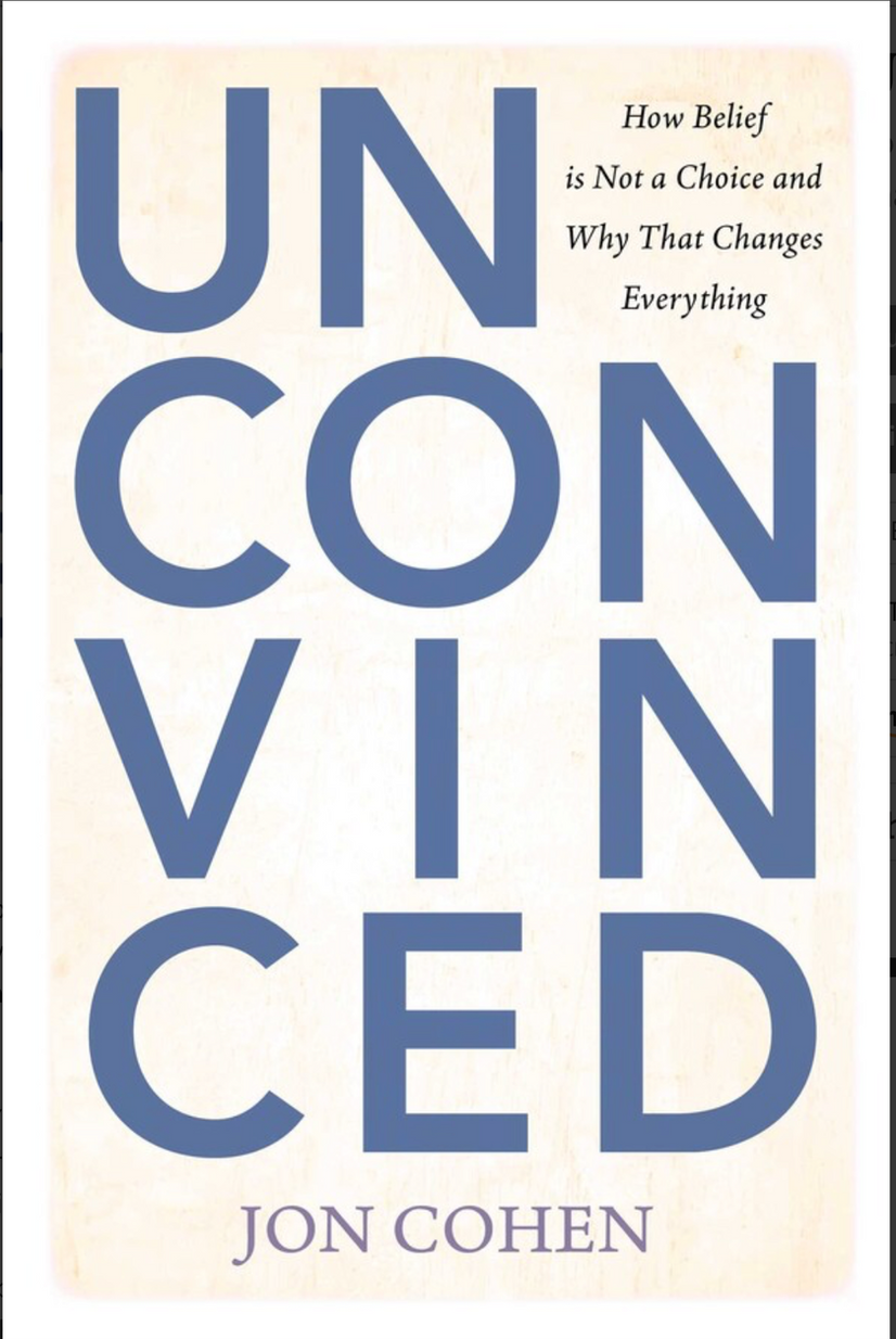 Cover of Unconvinced by Jon Cohen: the title set in tall slate-blue capitals on an ivory ground.